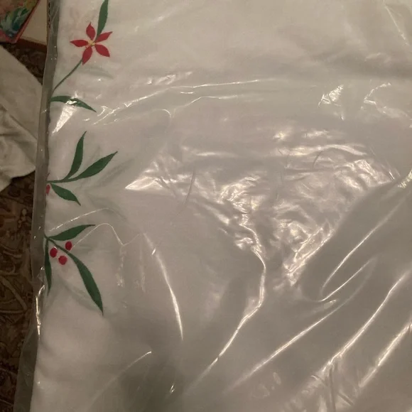 NWT Holiday table clothes in original packing never used
